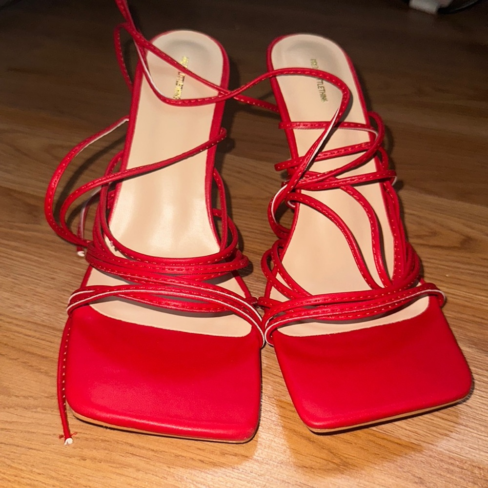 Red pretty little thing square toe heals.